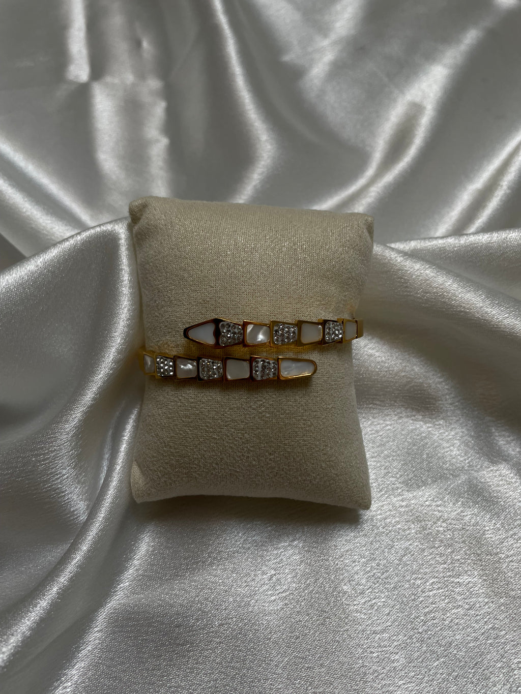 Serpent-inspired gold bracelet