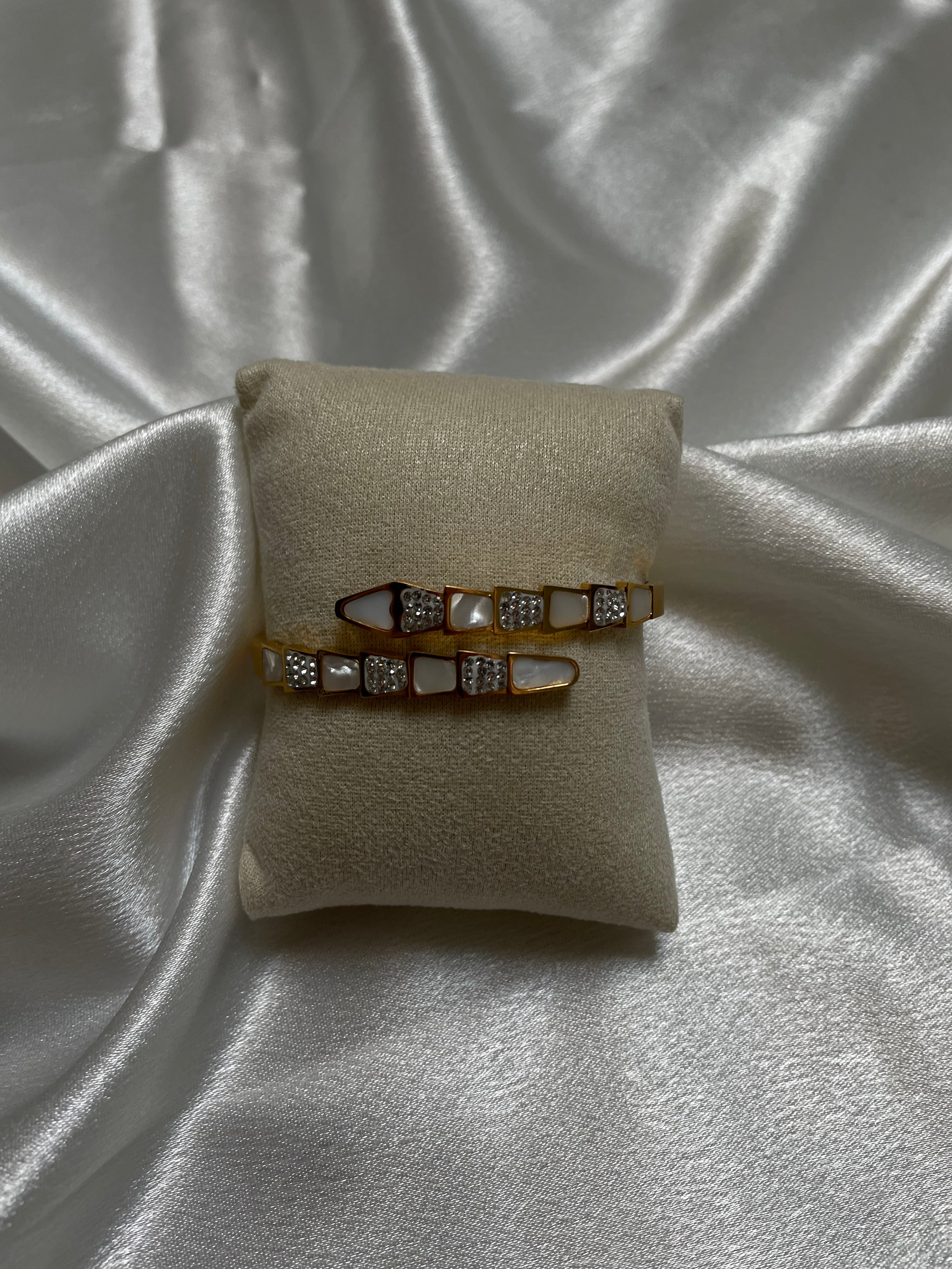 Serpent-inspired gold bracelet