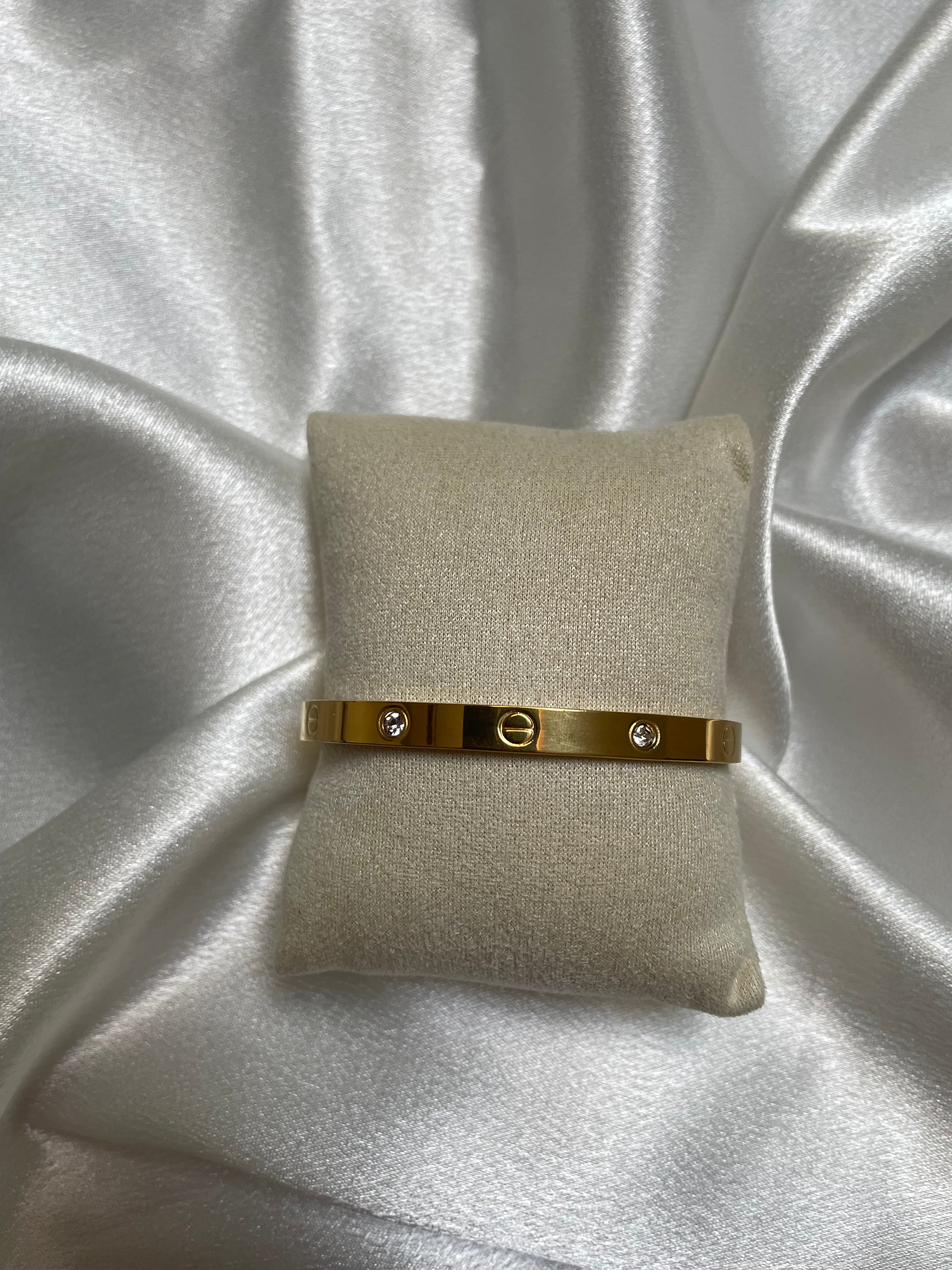 Gold signature bracelet with diamonds